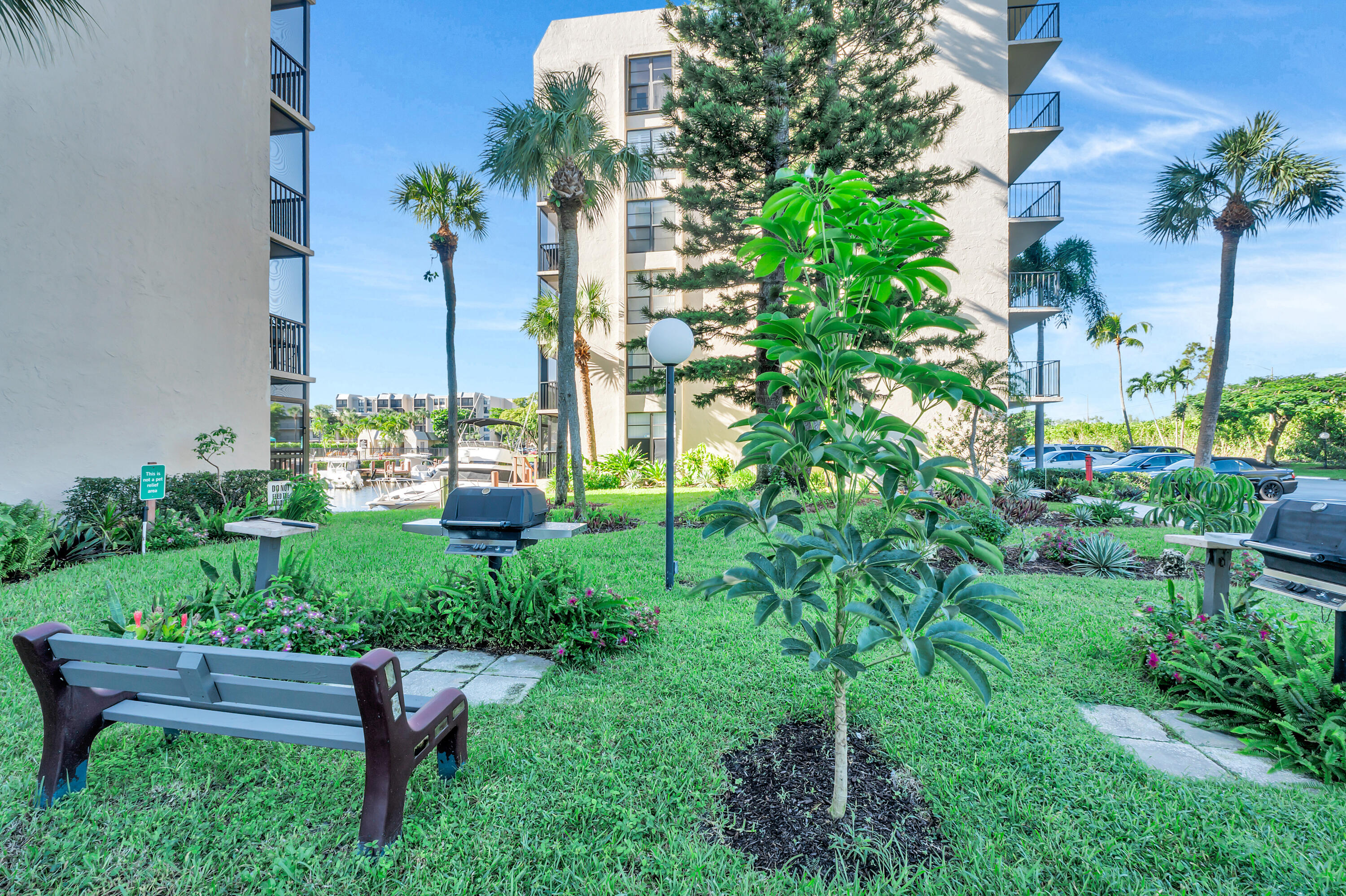 4 Royal Palm Way, Unit 601 Boca Raton, FL 33432 - Photo 31 of 34 a garden view with a seating space
