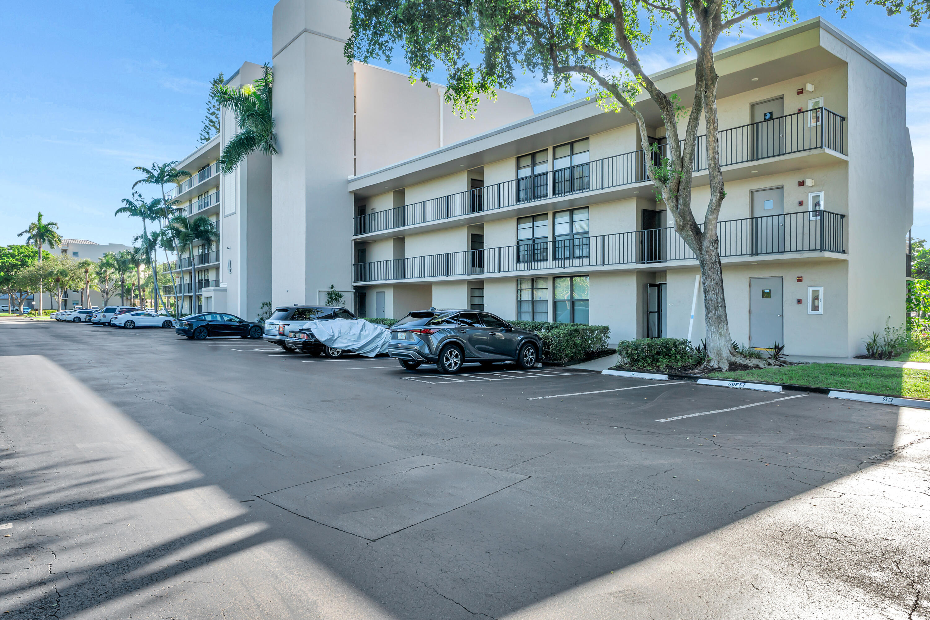 4 Royal Palm Way, Unit 601 Boca Raton, FL 33432 - Photo 34 of 34 a cars parked in front of brick building