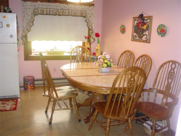 185 Roy Street Springfield, MA 01104 - Photo 6 of 8 a dining room with furniture and window