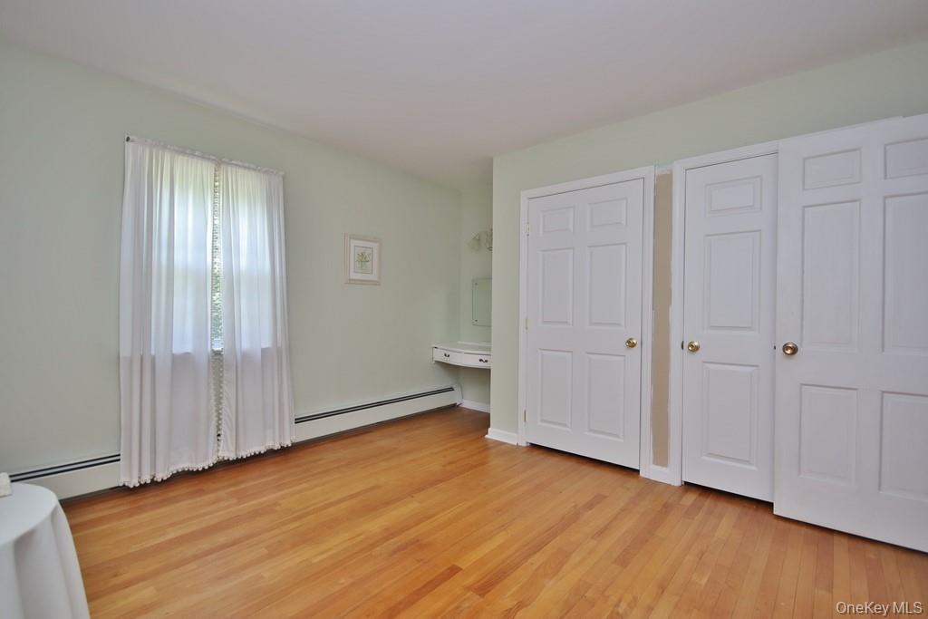 72 Egbertson Road Campbell Hall, NY 10916 - Photo 25 of 45 Bedroom #1 with hardwood floors and large closets