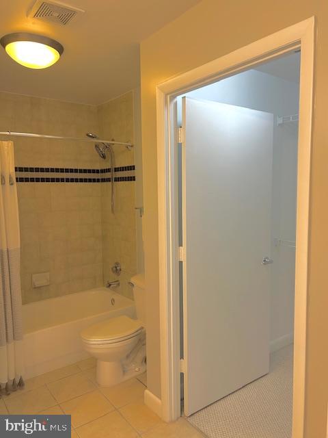 400 Massachusetts Avenue Northwest, Unit 608 Washington, DC 20001 - Photo 15 of 25 a bathroom with a shower and a toilet