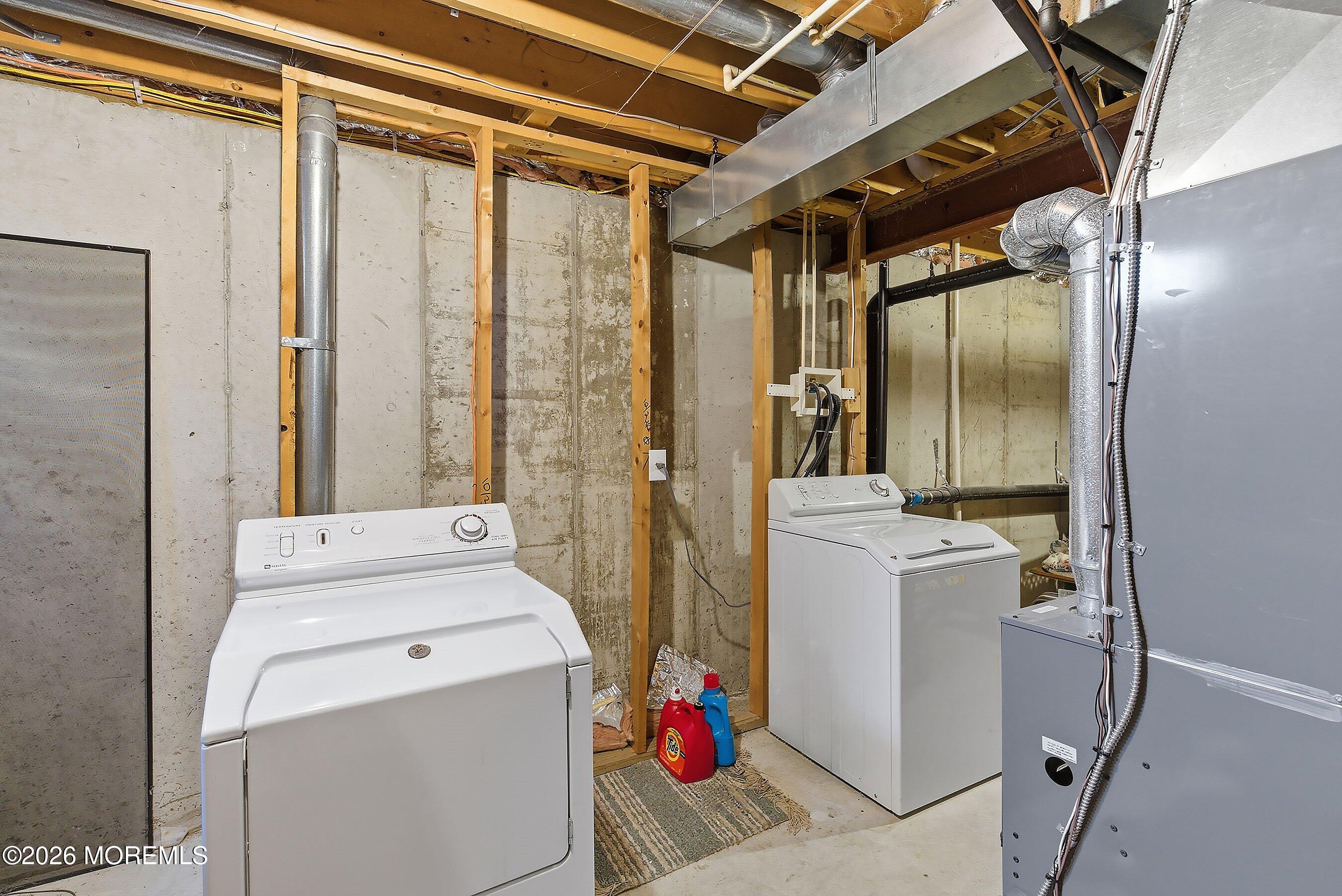 15 Benjamin Court Barnegat, NJ 08005 - Photo 21 of 24 a utility room with dryer and washer