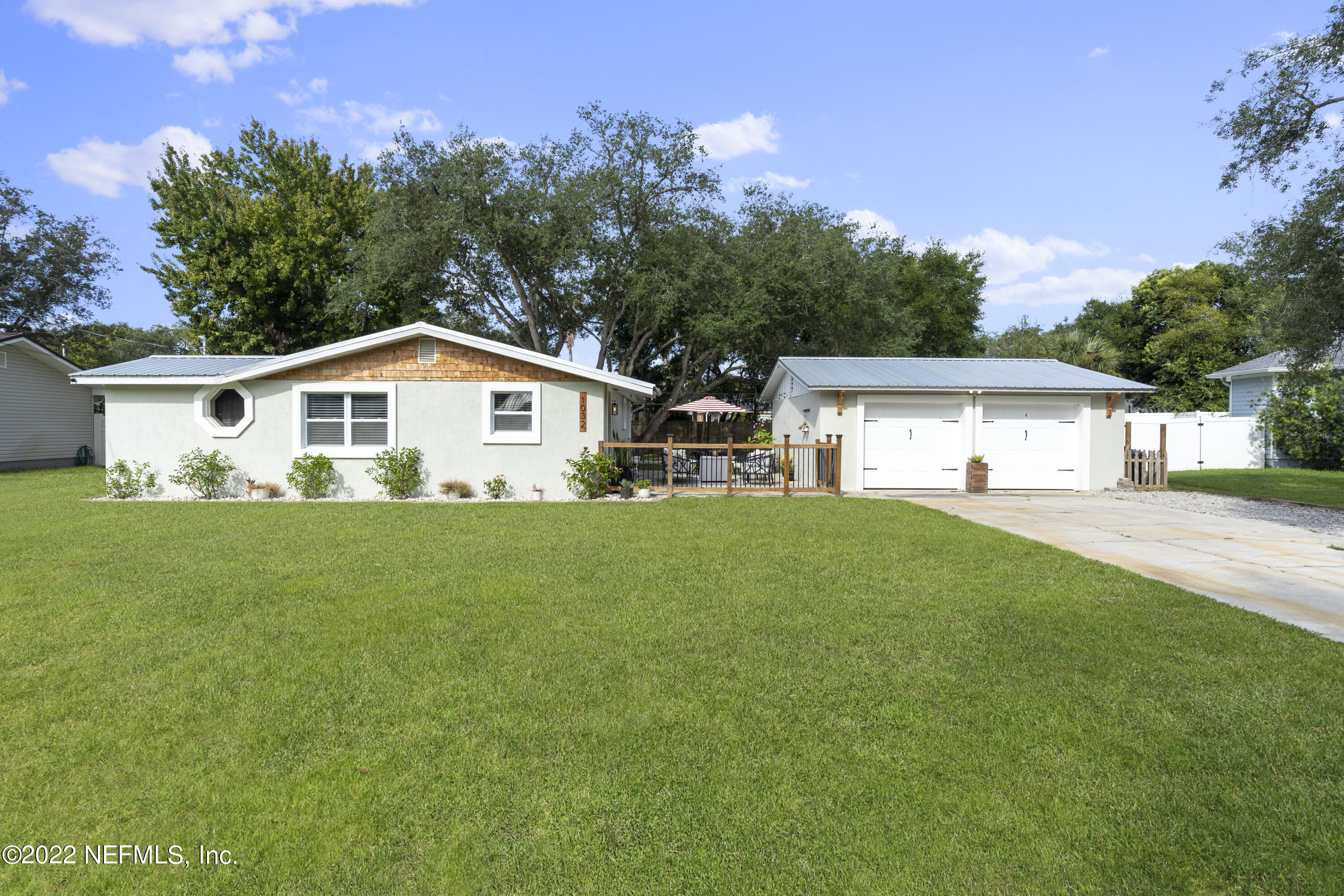 1032 Prince Road St. Augustine, FL 32086 - Photo 1 of 39 a house view with a garden space