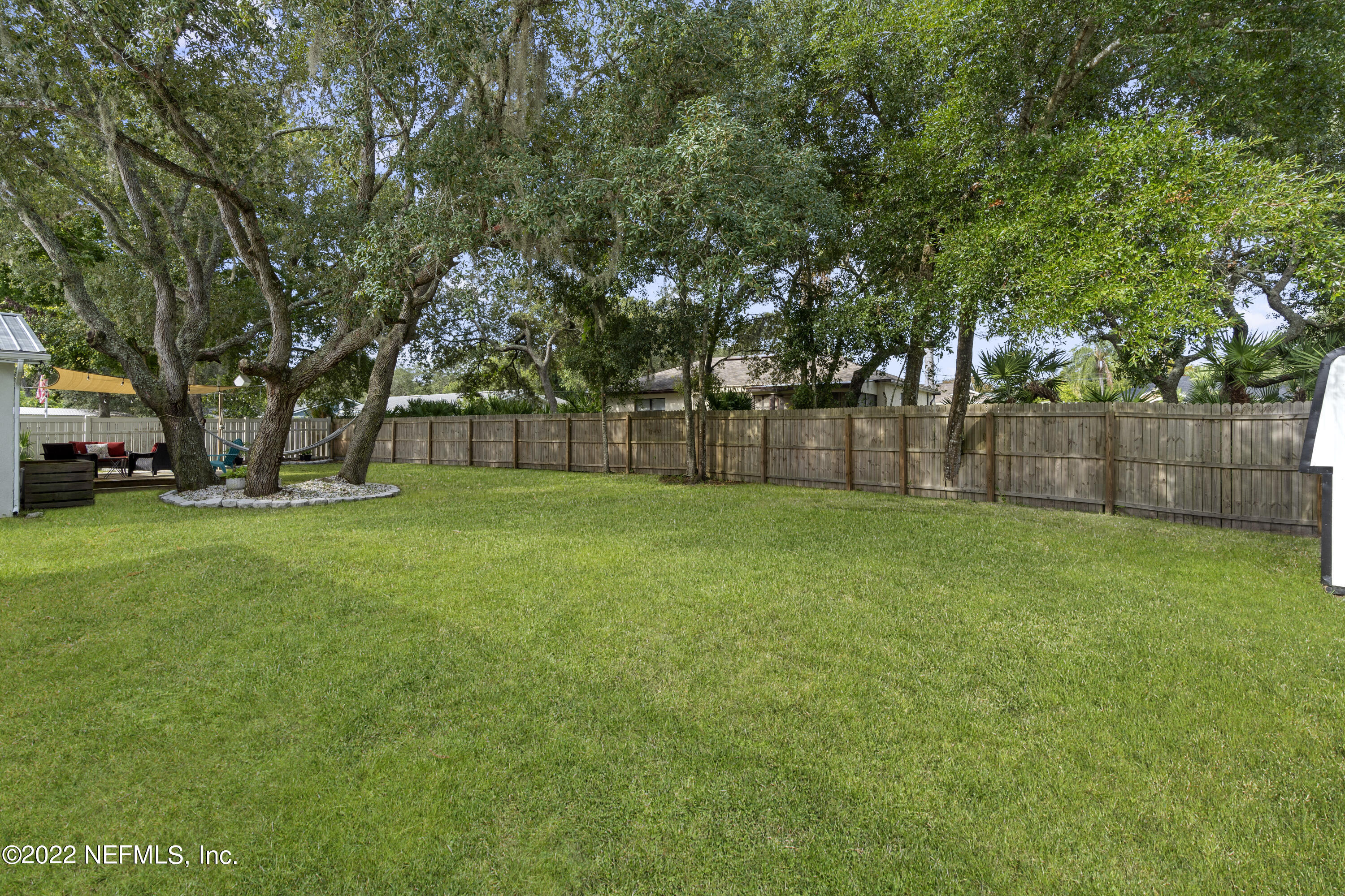1032 Prince Road St. Augustine, FL 32086 - Photo 12 of 39 a view of a yard with a house in the background
