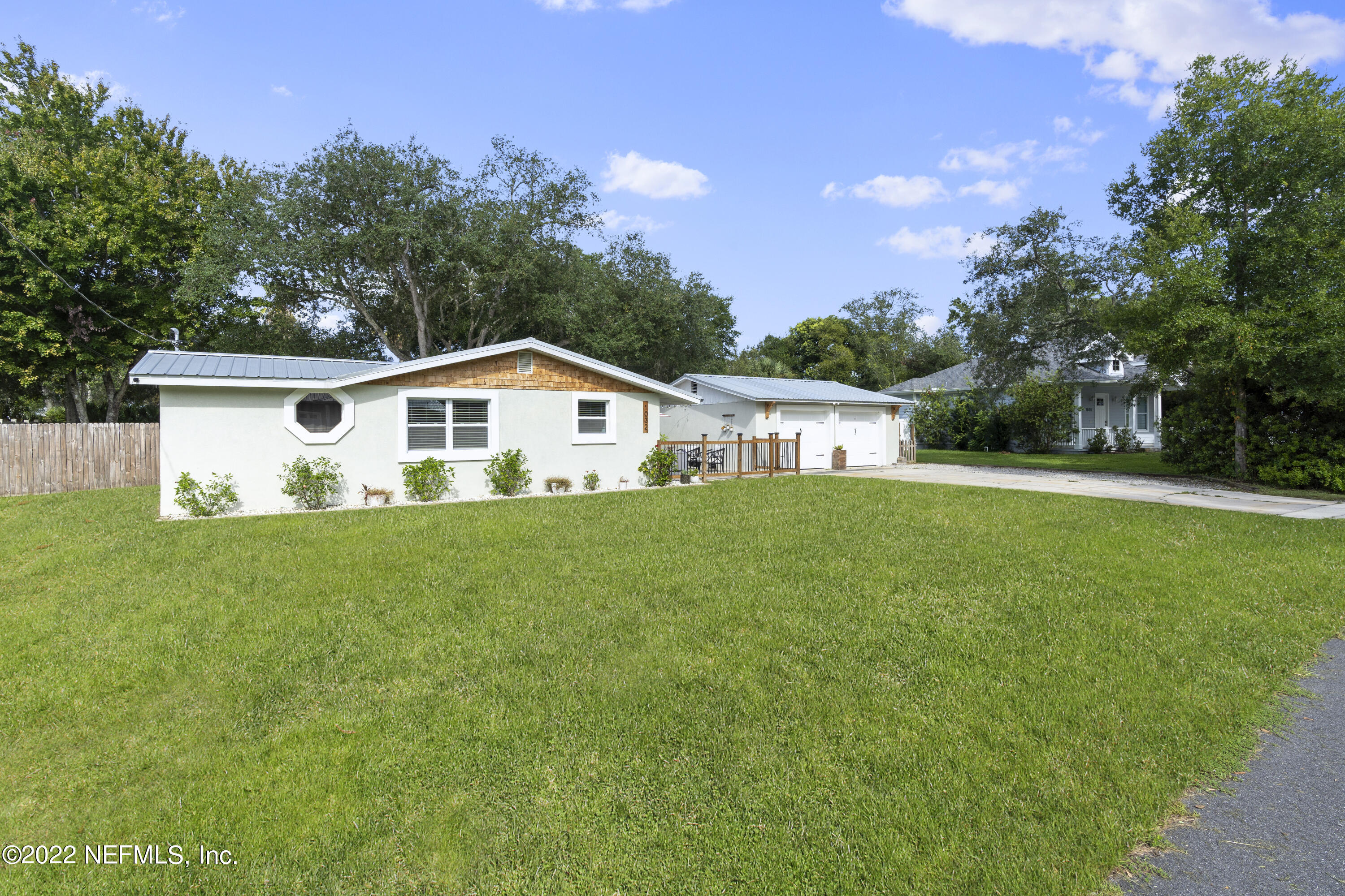 1032 Prince Road St. Augustine, FL 32086 - Photo 2 of 39 a view of house with garden and trees