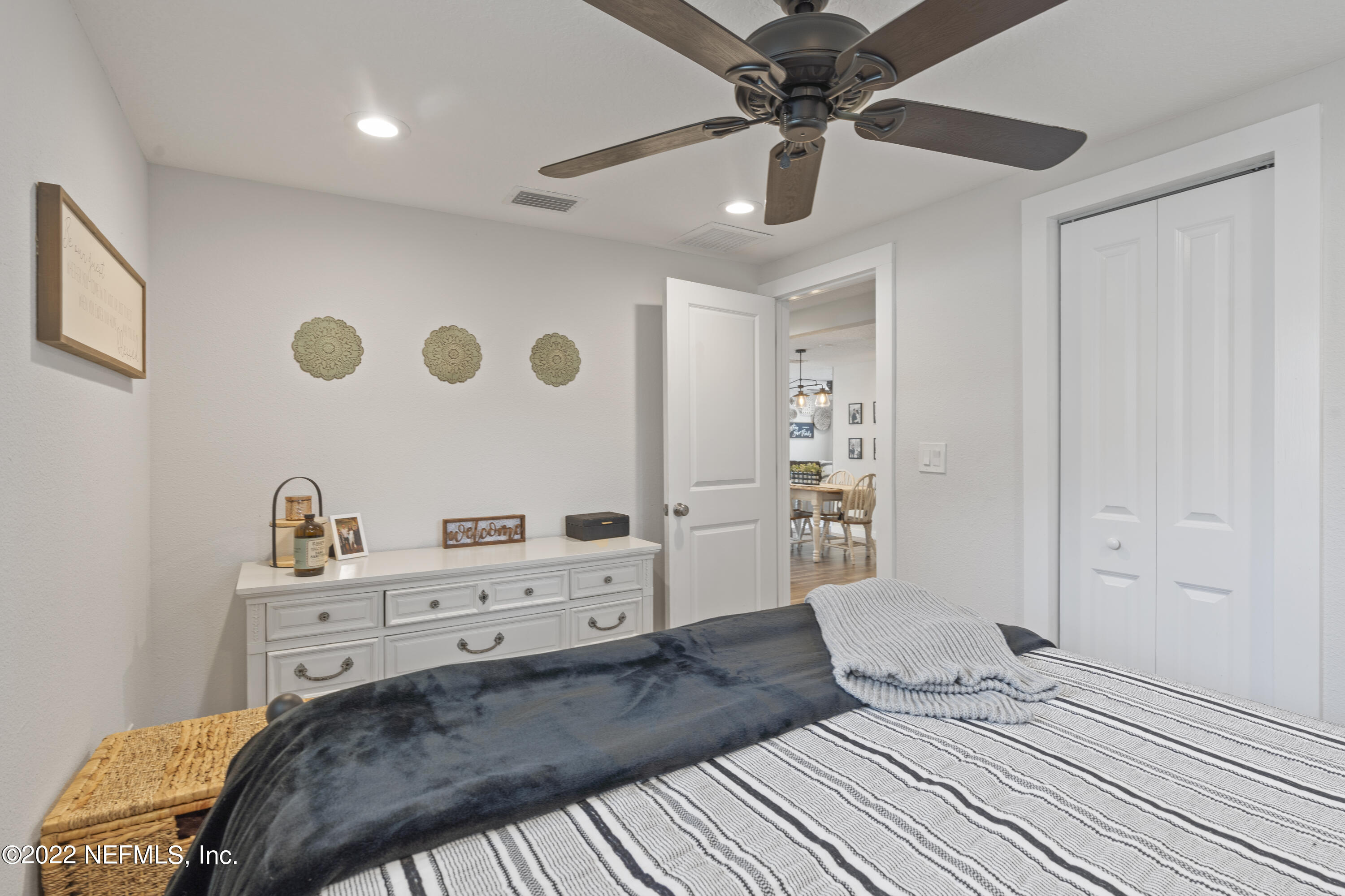 1032 Prince Road St. Augustine, FL 32086 - Photo 33 of 39 a bedroom with a bed and a ceiling fan