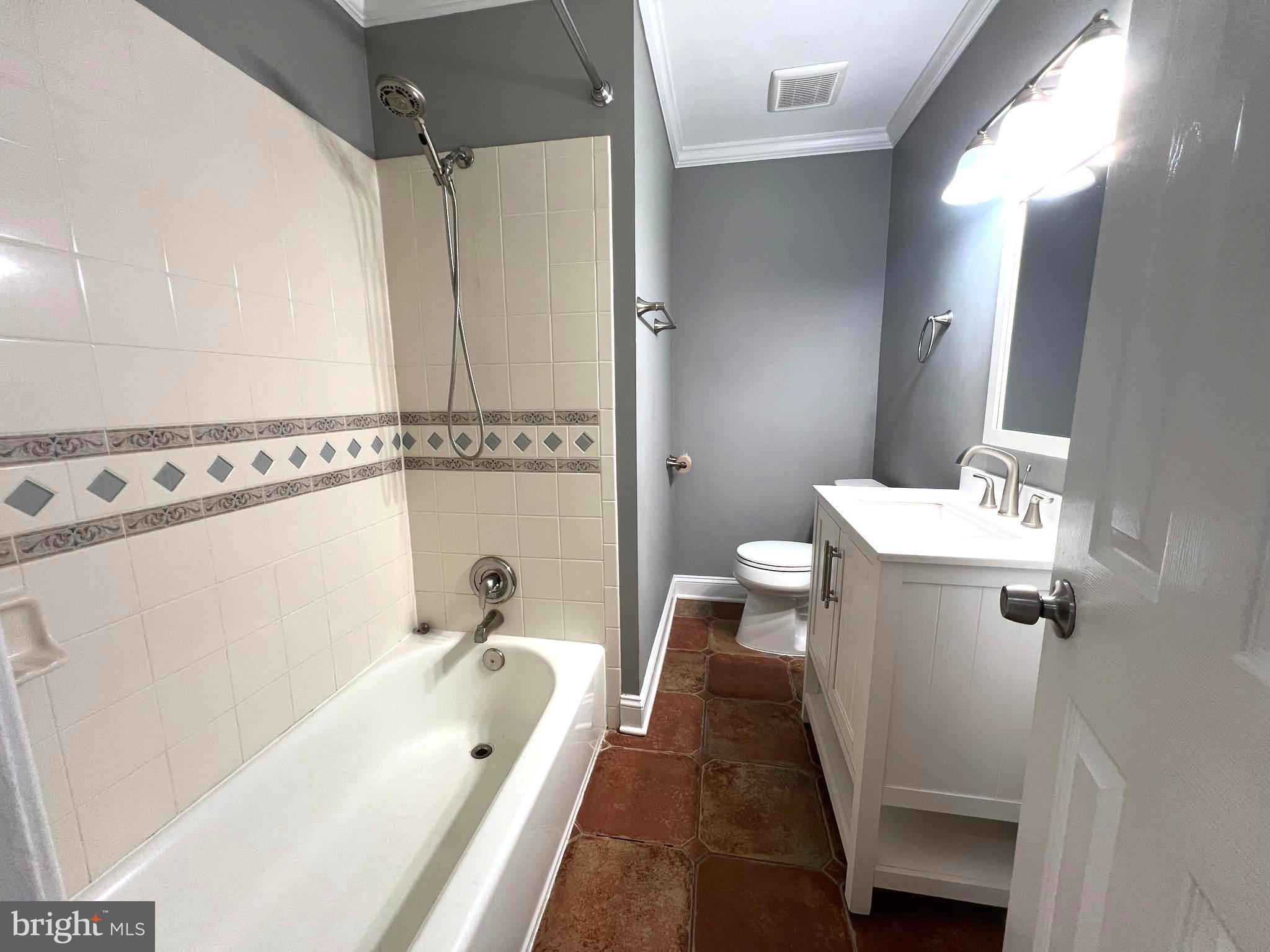 19956 Broad Run Drive Sterling, VA 20165 - Photo 20 of 24 a bathroom with a tub a sink and mirror
