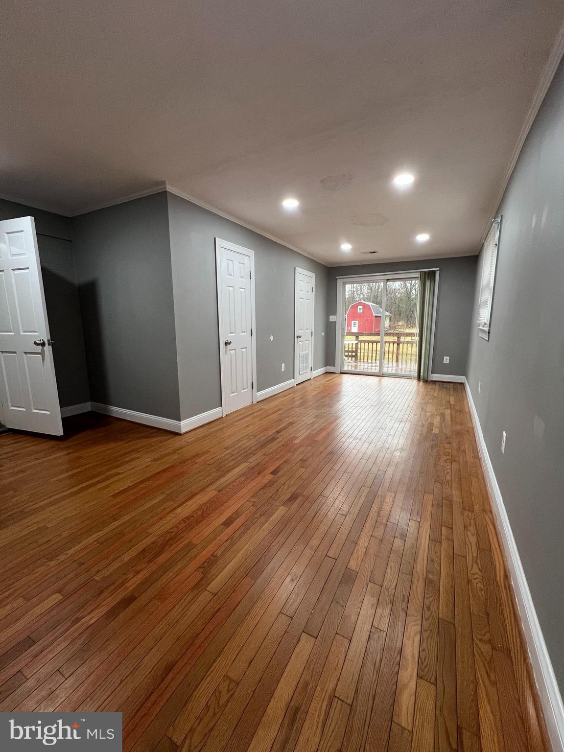 19956 Broad Run Drive Sterling, VA 20165 - Photo 10 of 24 a view of an empty room with wooden floor