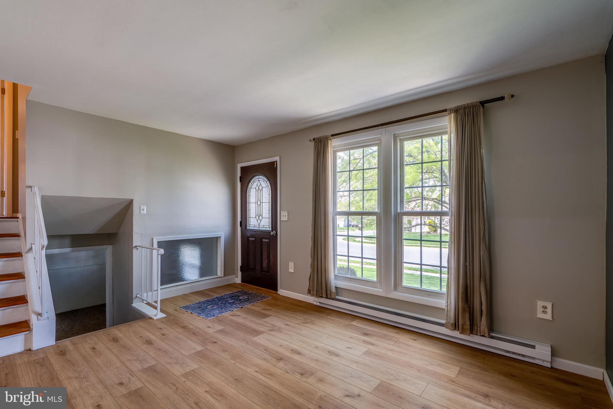 166 Pulte Road Lancaster, PA 17601 - Photo 12 of 41 a view of empty room with wooden floor and fan