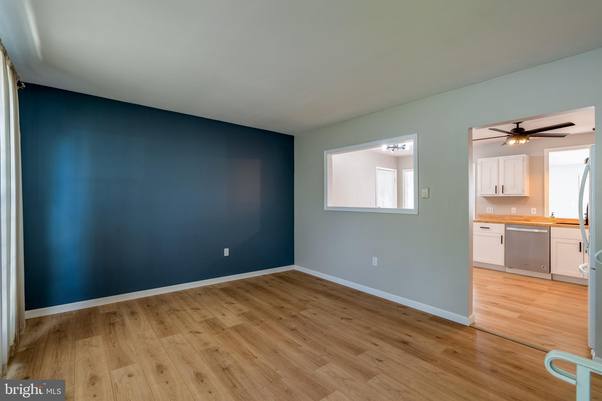 166 Pulte Road Lancaster, PA 17601 - Photo 13 of 41 an empty room with wooden floor and windows