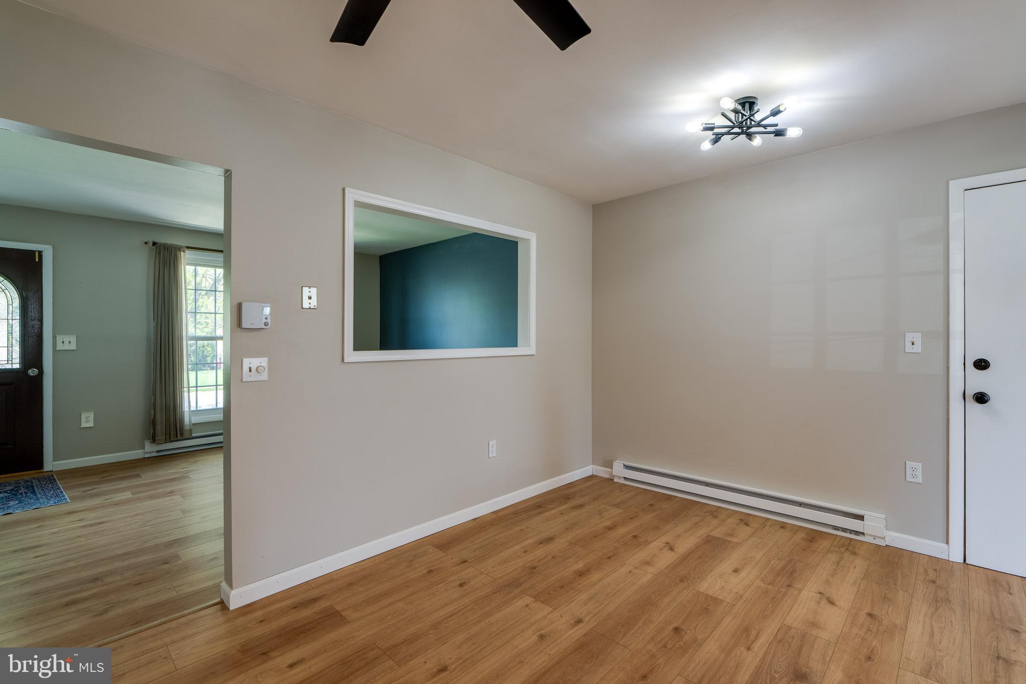 166 Pulte Road Lancaster, PA 17601 - Photo 19 of 41 wooden floor in an empty room with a window
