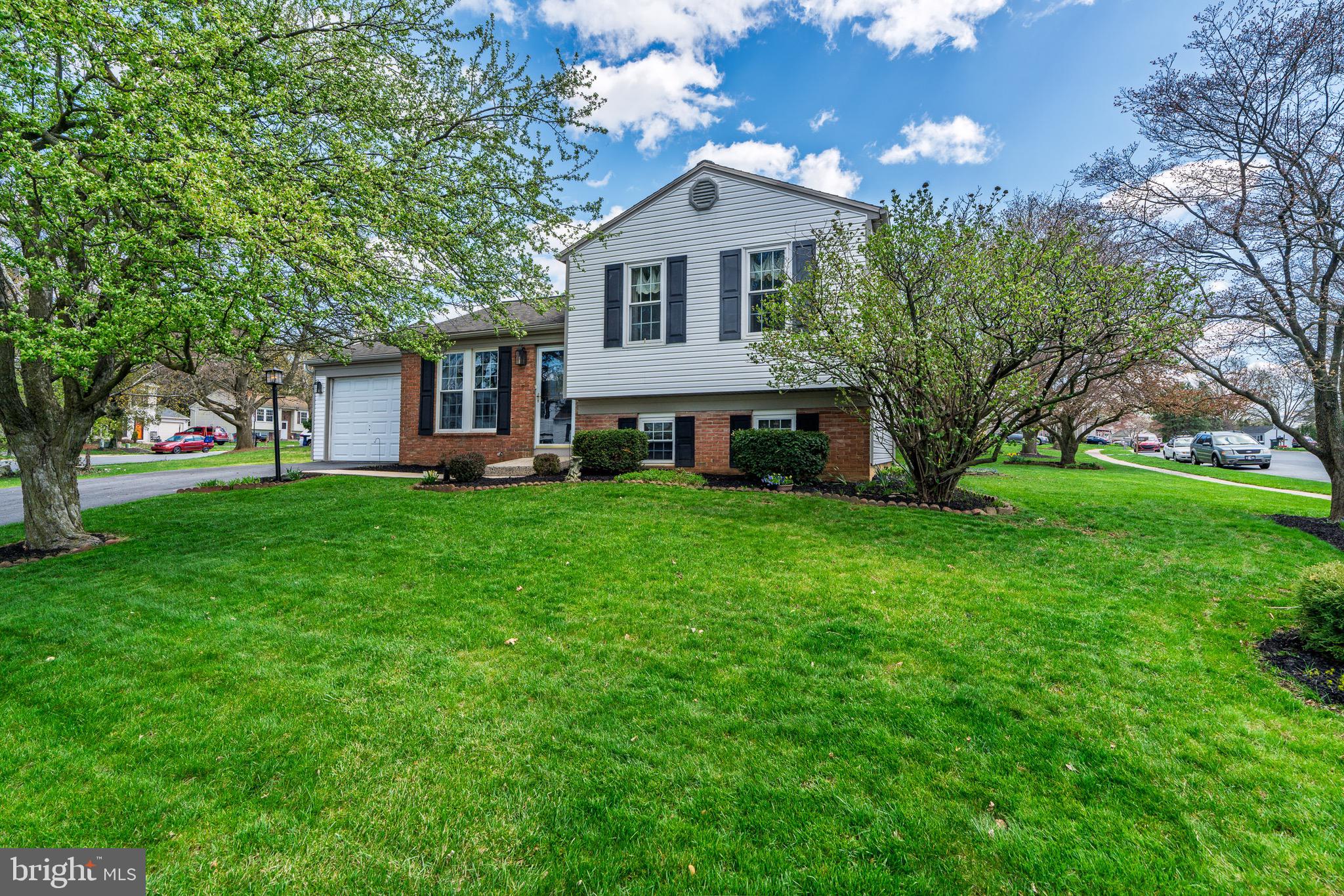166 Pulte Road Lancaster, PA 17601 - Photo 3 of 41 a front view of house with yard and green space