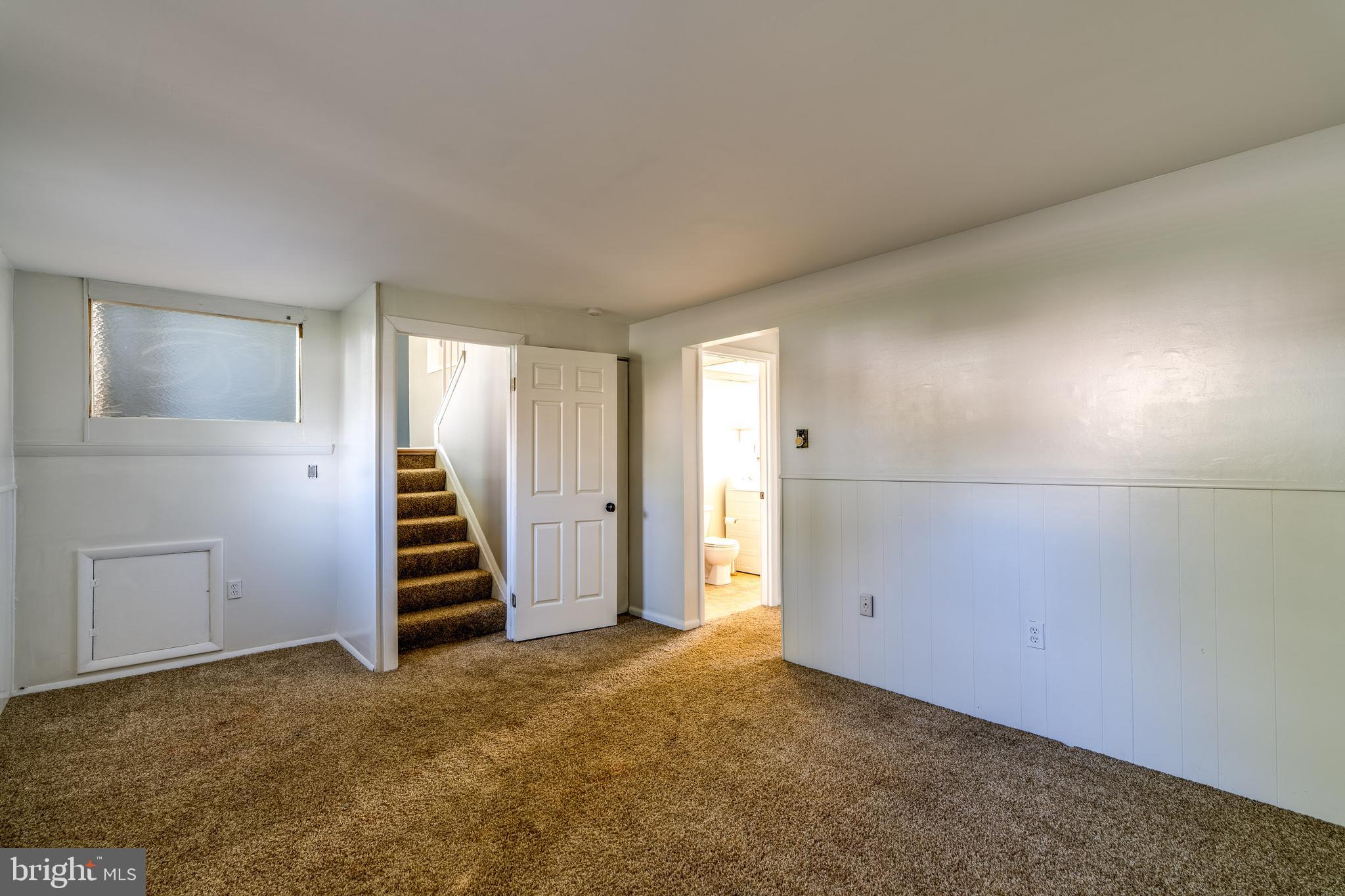 166 Pulte Road Lancaster, PA 17601 - Photo 34 of 41 an empty room with a kitchen and entryway