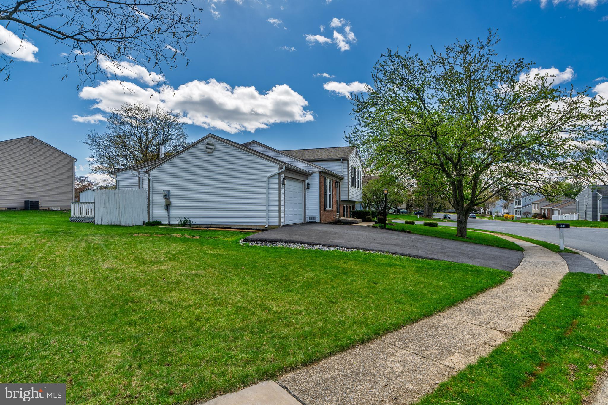166 Pulte Road Lancaster, PA 17601 - Photo 6 of 41 a view of a house with a yard