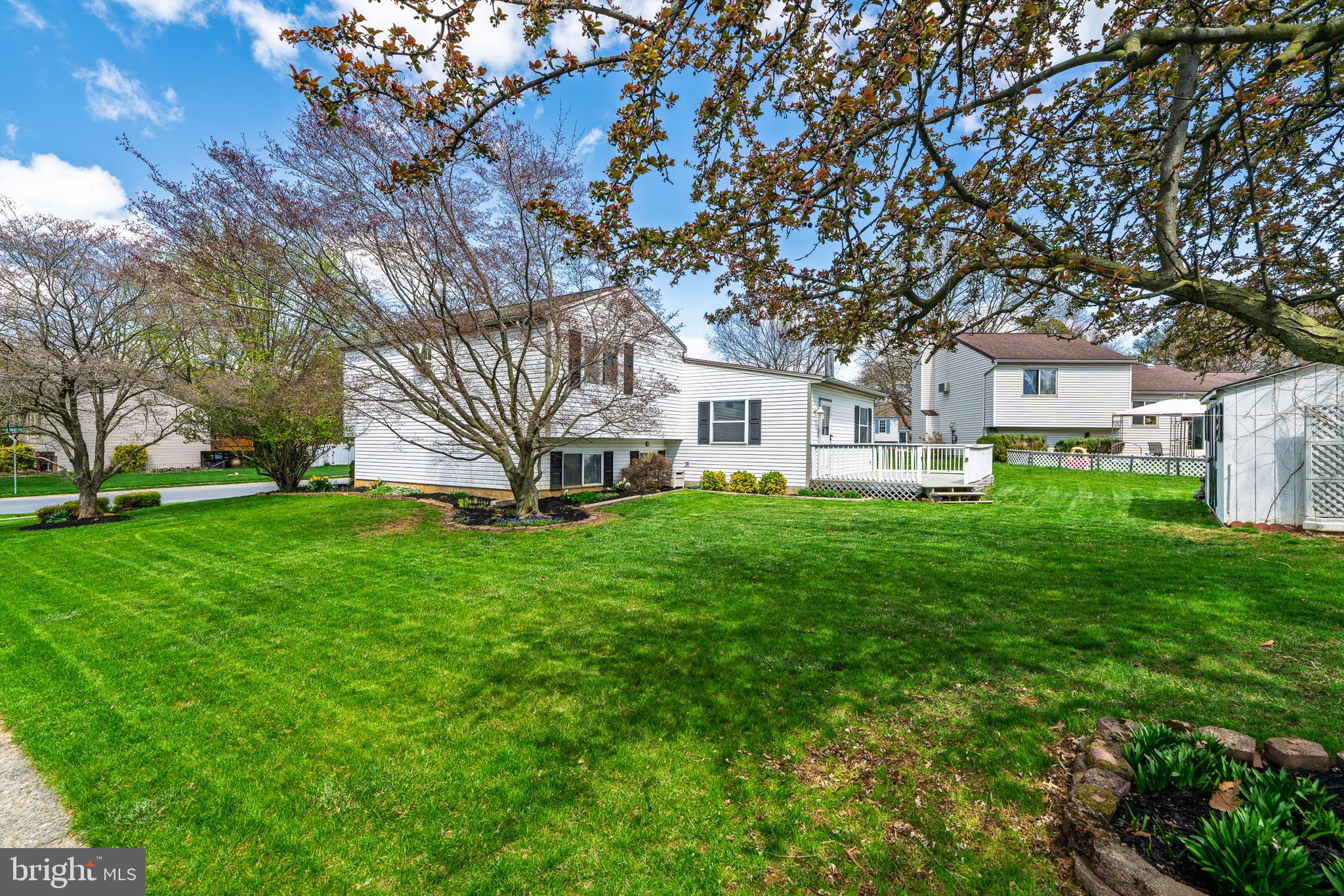 166 Pulte Road Lancaster, PA 17601 - Photo 7 of 41 a view of a house with a big yard and large trees
