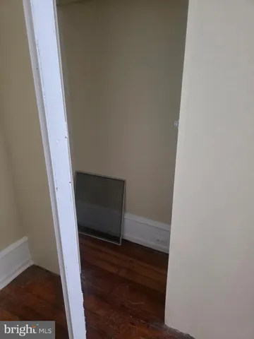 a kitchen with a sink a stove and cabinets