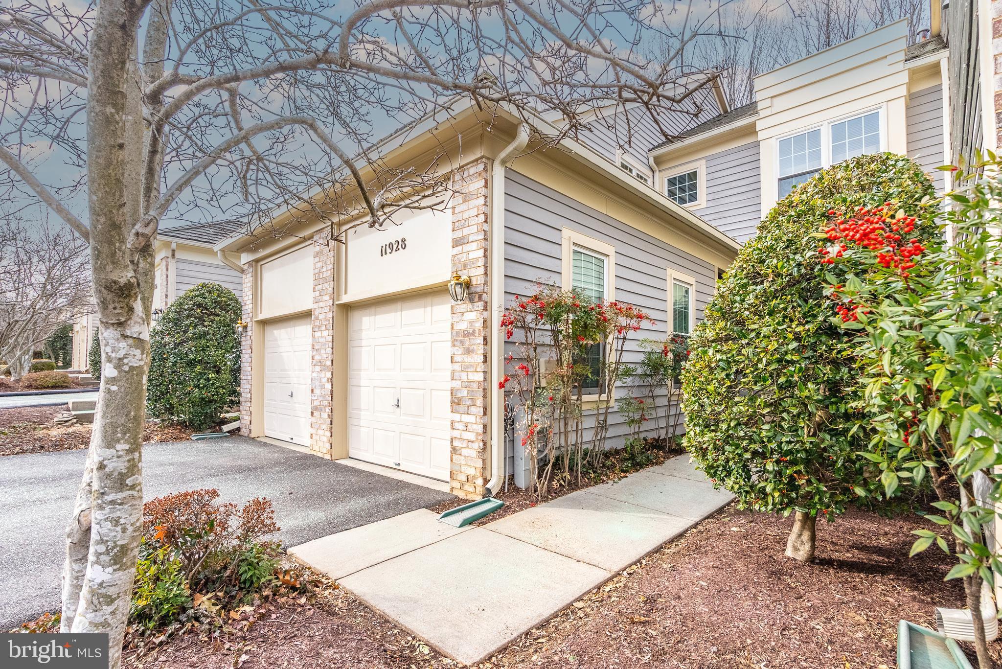 11928 St Francis Way Bowie, MD 20721 - Photo 2 of 48 a view of a house with a yard