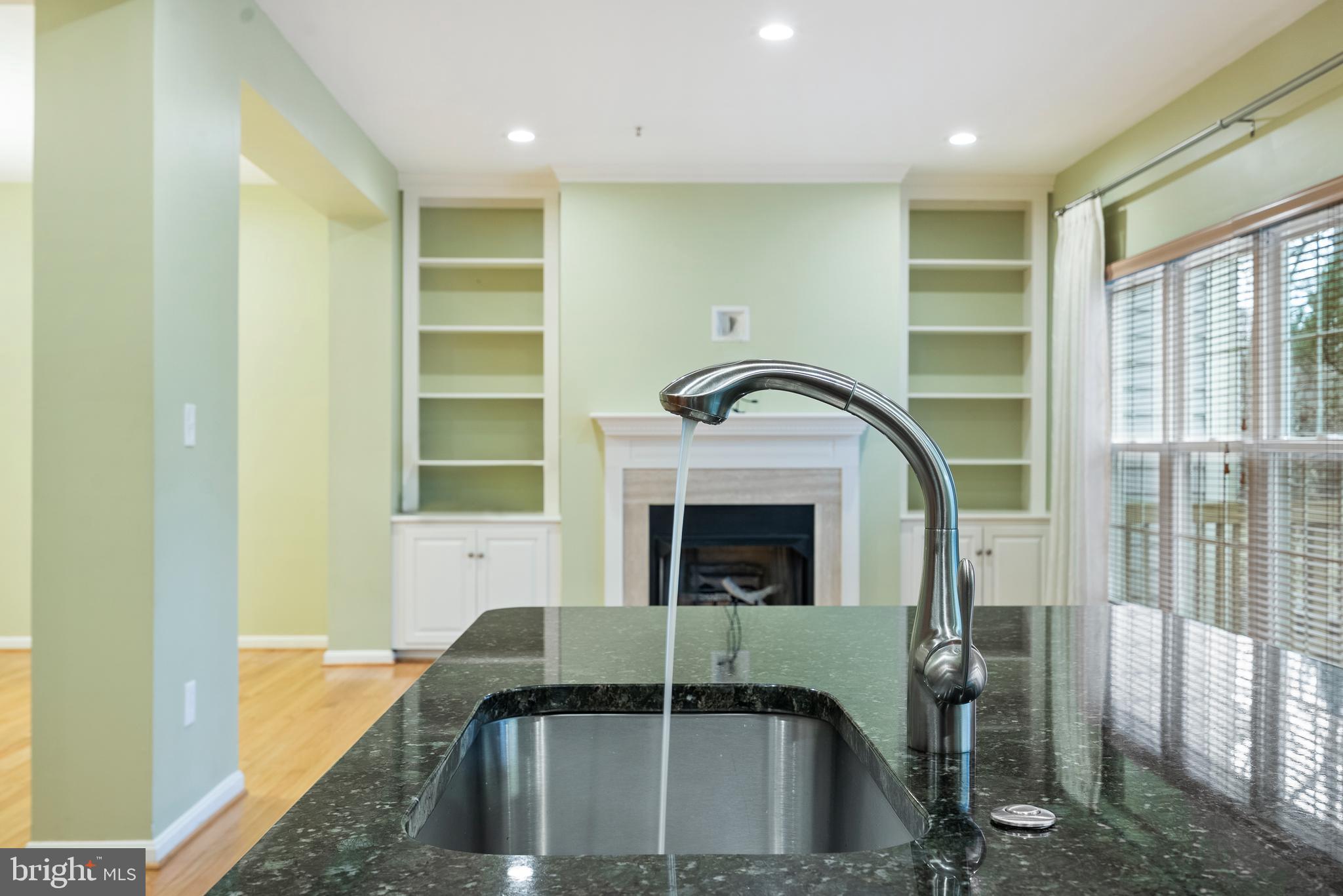 11928 St Francis Way Bowie, MD 20721 - Photo 22 of 48 a view of living room with furniture and a fireplace