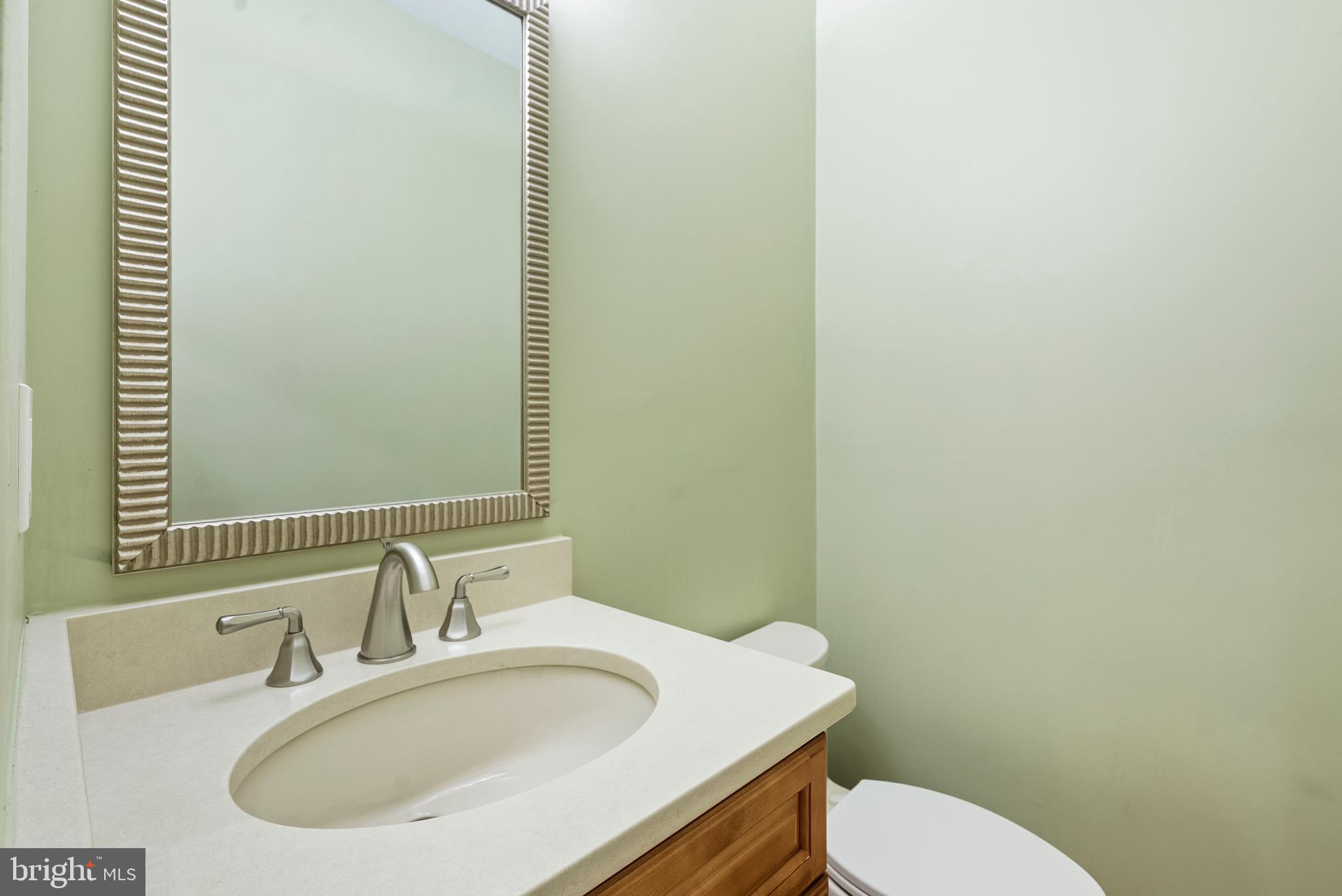 11928 St Francis Way Bowie, MD 20721 - Photo 23 of 48 a bathroom with a sink and a toilet