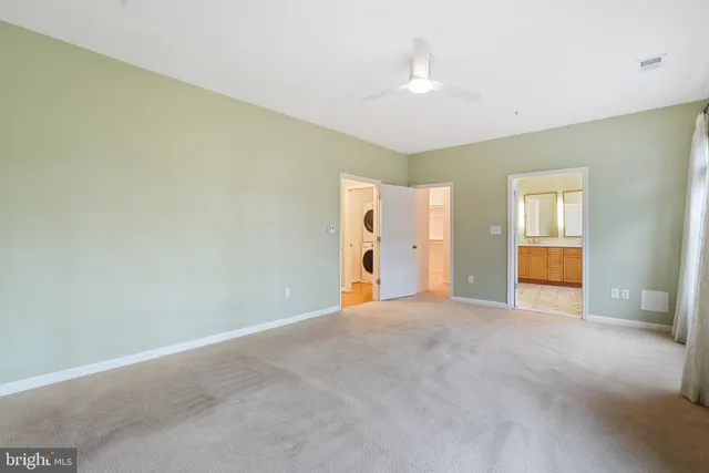 a view of an empty room with window