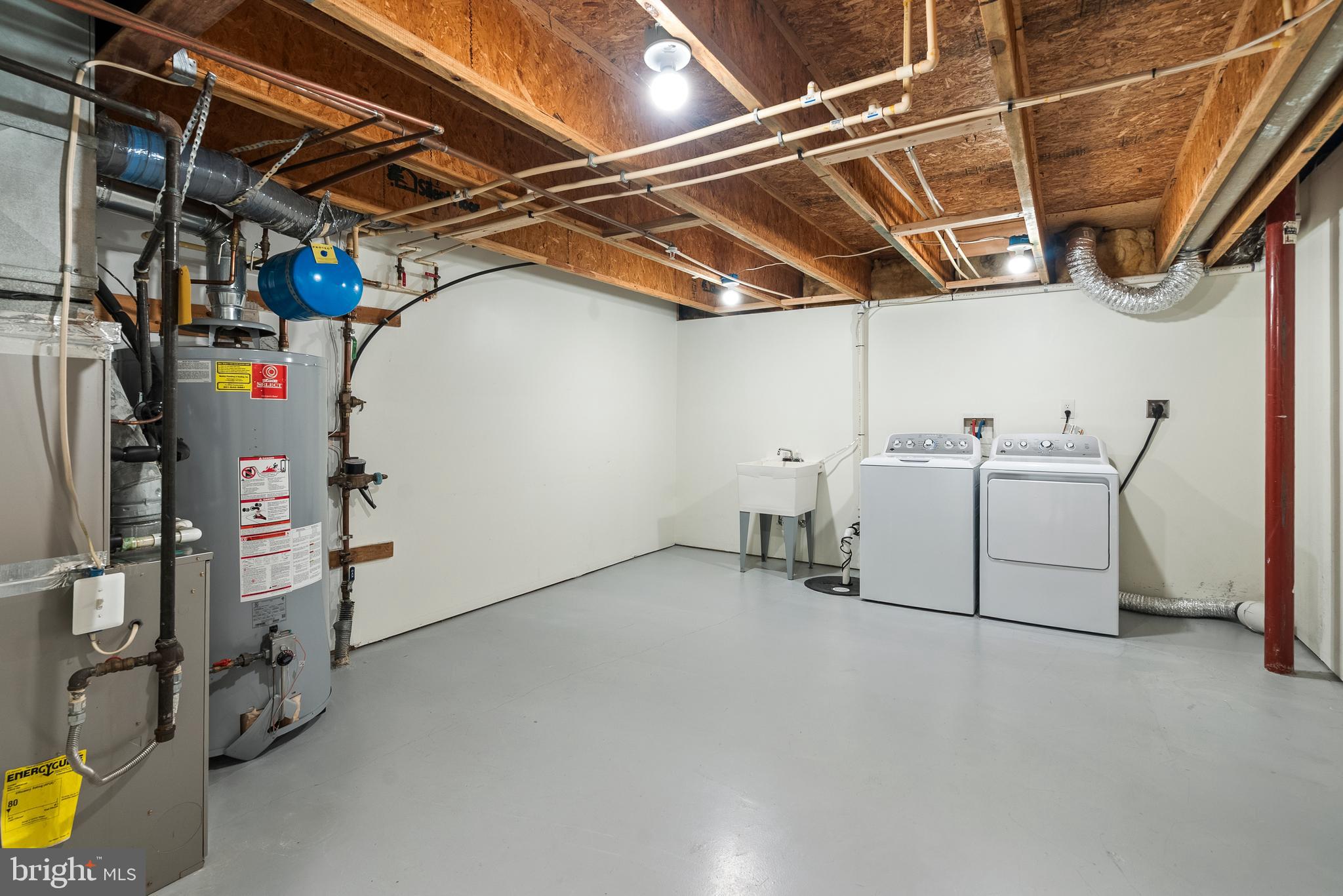 11928 St Francis Way Bowie, MD 20721 - Photo 44 of 48 a utility room with dryer and washer