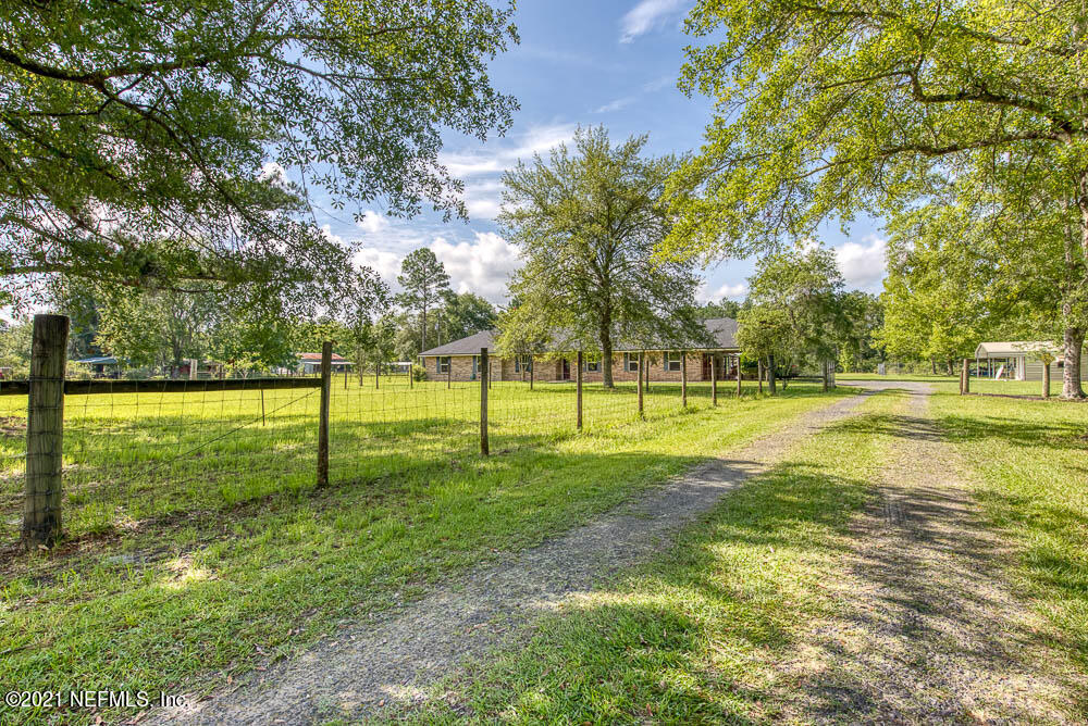 1241 D B Hicks Road Bryceville, FL 32009 - Photo 26 of 33 Front Entry and Driveway