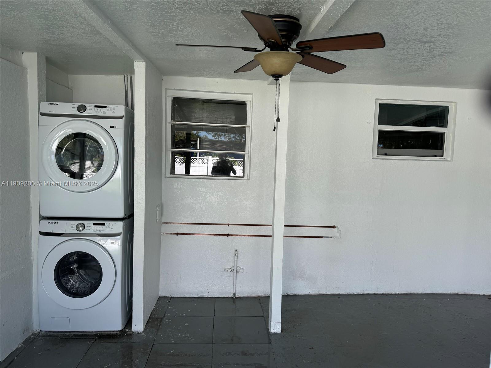 2400 North 57th Way Hollywood, FL 33021 - Photo 10 of 10 a view of a livingroom with washer and dryer