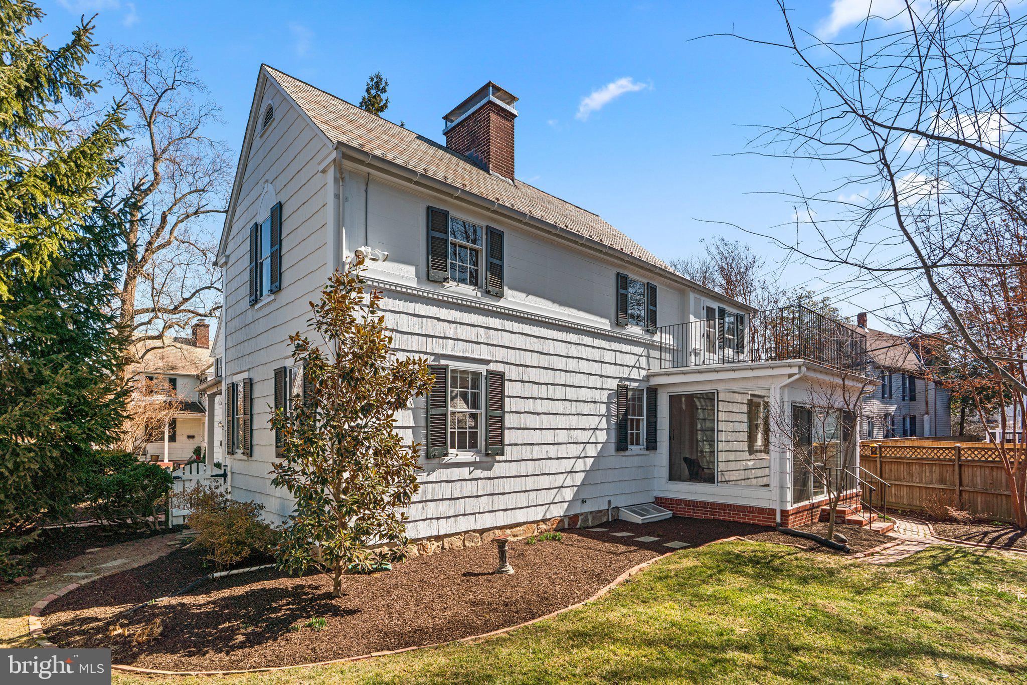 2 St Dunstans Garth Baltimore, MD 21212 - Photo 37 of 45 a front view of a house with yard outdoor seating and covered with trees