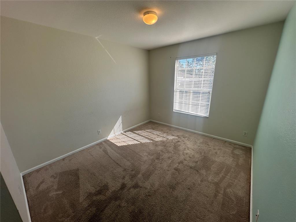 588 Brantley Terrace Way, Unit 303 Altamonte Springs, FL 32714 - Photo 11 of 24 a view of empty room with window