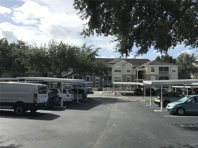 a view of a street with cars