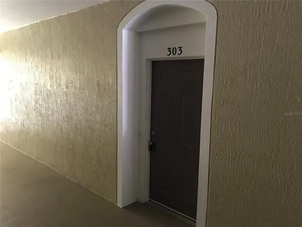 a view of hallway with sink