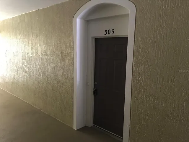 a view of hallway with sink