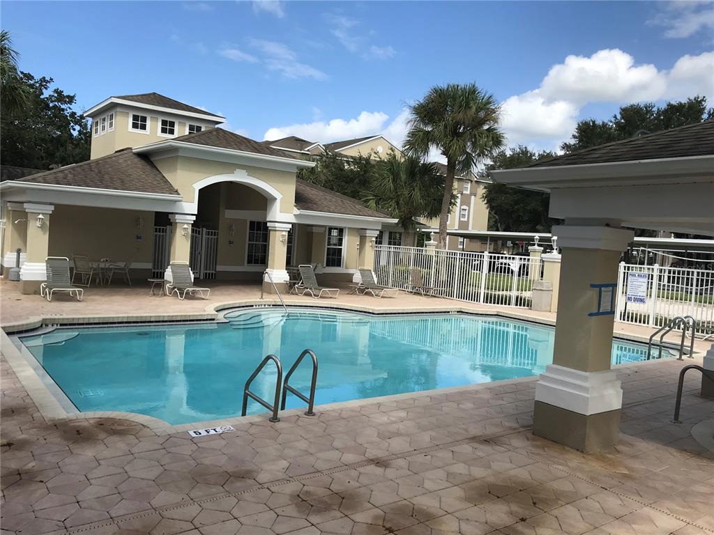 588 Brantley Terrace Way, Unit 303 Altamonte Springs, FL 32714 - Photo 24 of 24 a front view of a house with swimming pool