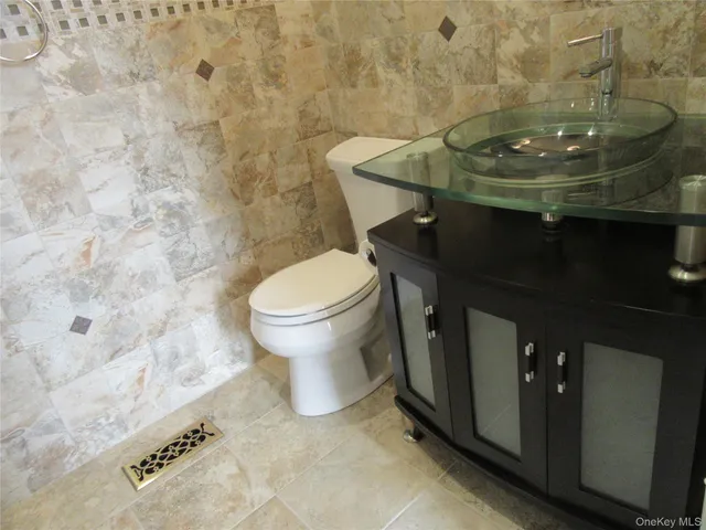 a bathroom with a sink and a toilet