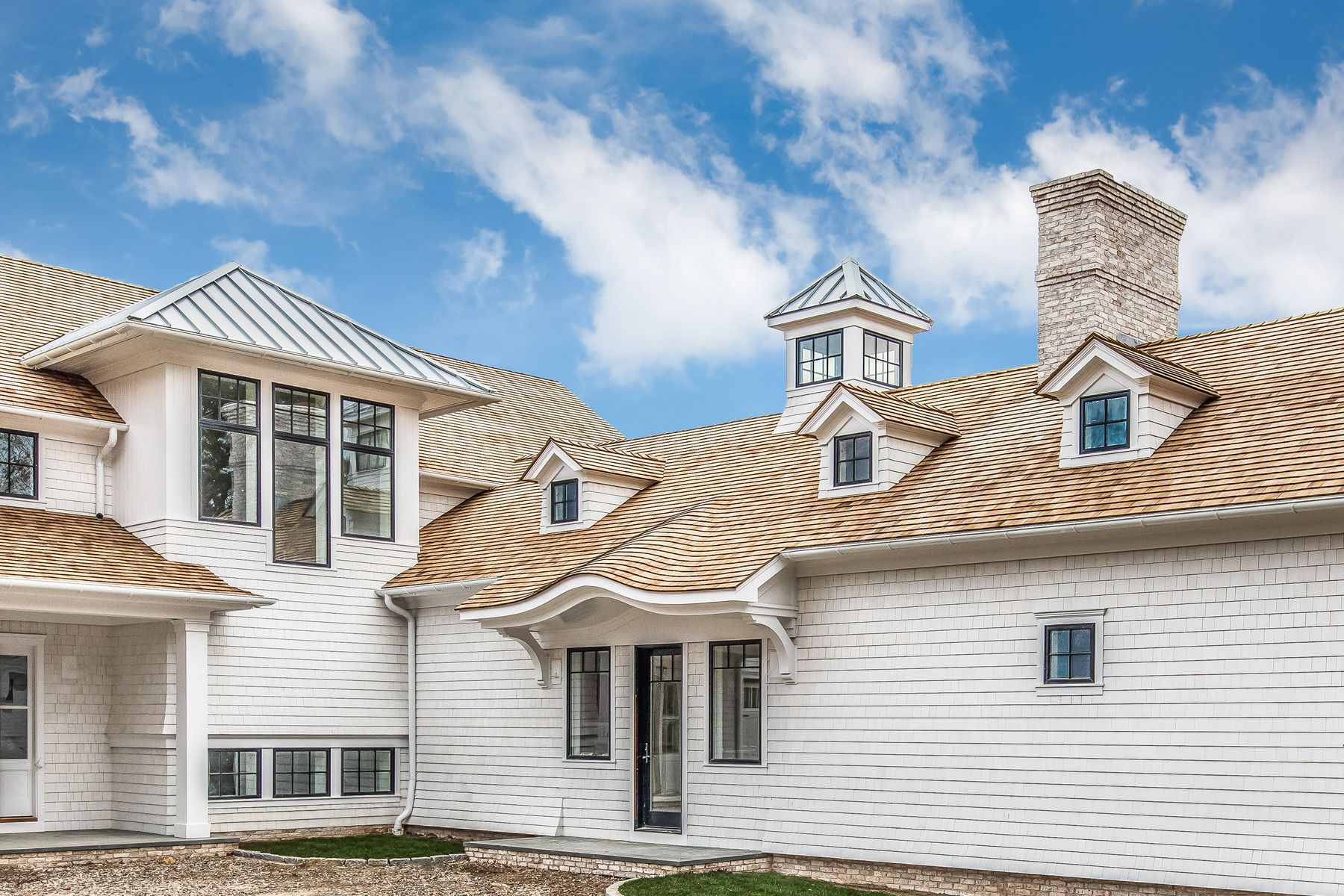 159 Middle Highway East Hampton, NY 11937 - Photo 14 of 18 a front view of a house with a porch