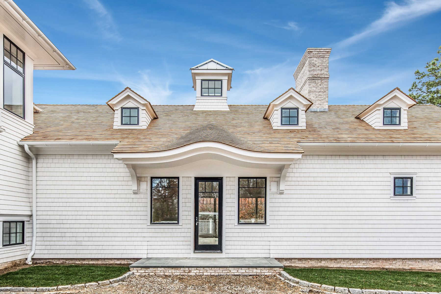 159 Middle Highway East Hampton, NY 11937 - Photo 15 of 18 a front view of a house with a yard