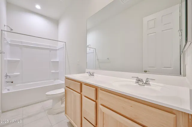 a bathroom with a sink a toilet and a bathtub