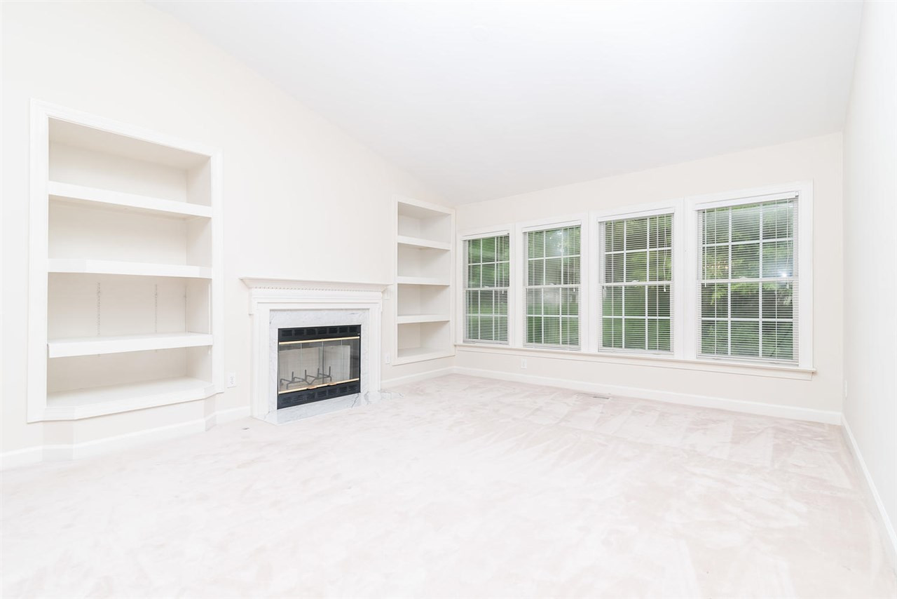 4208 Sprucedale Drive Raleigh, NC 27613 - Photo 8 of 21 Living Room with wall of windows