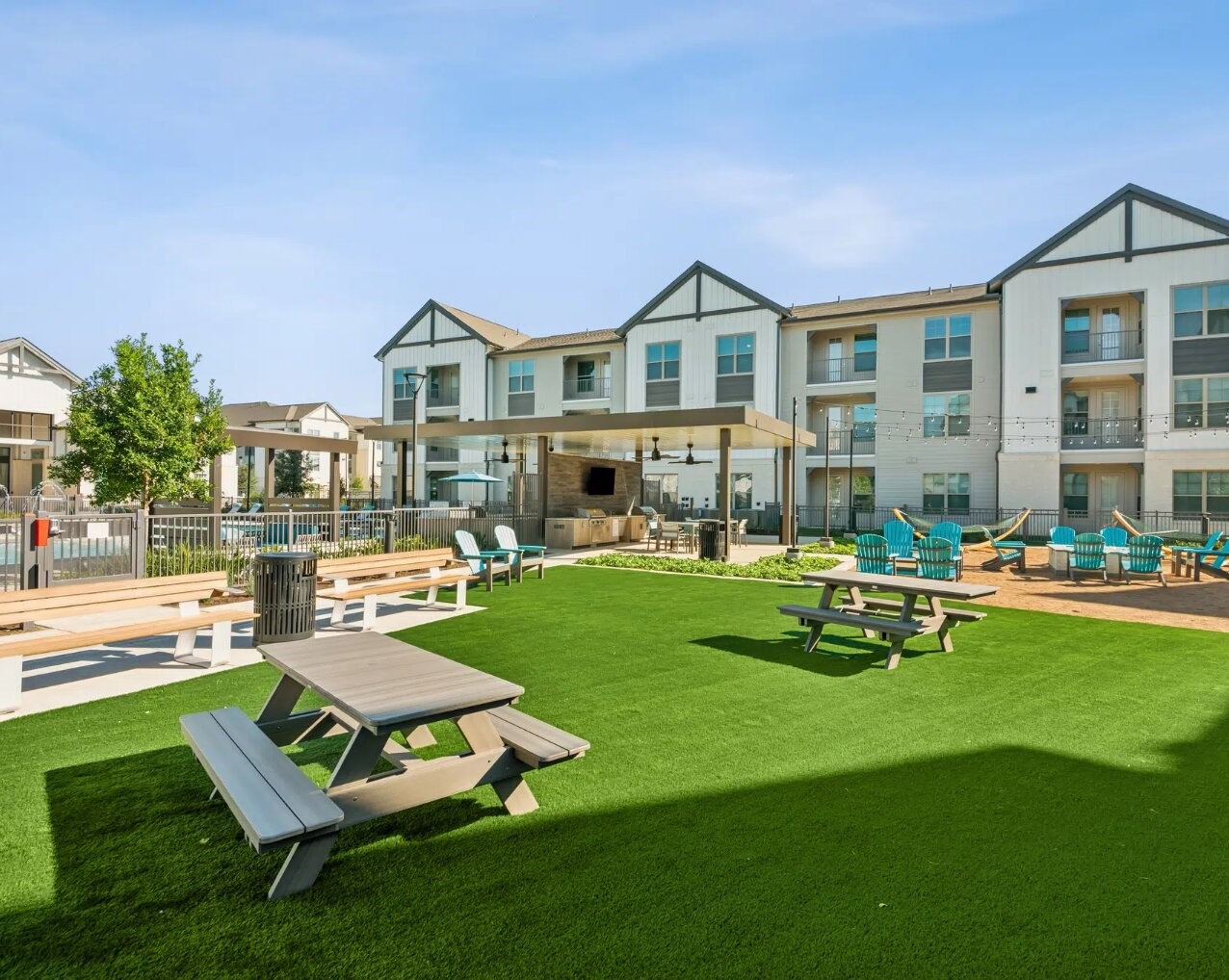 17013 Becker Road, Unit 7309 Hockley, TX 77447 - Photo 15 of 18 a front view of a house with swimming pool having outdoor seating