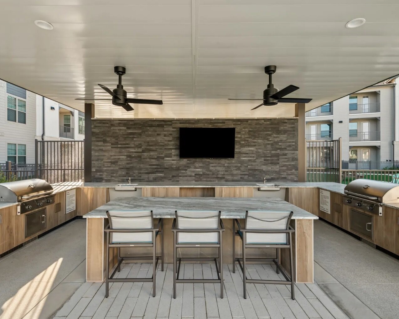 17013 Becker Road, Unit 7309 Hockley, TX 77447 - Photo 16 of 18 a view of a chairs and a tables in the balcony