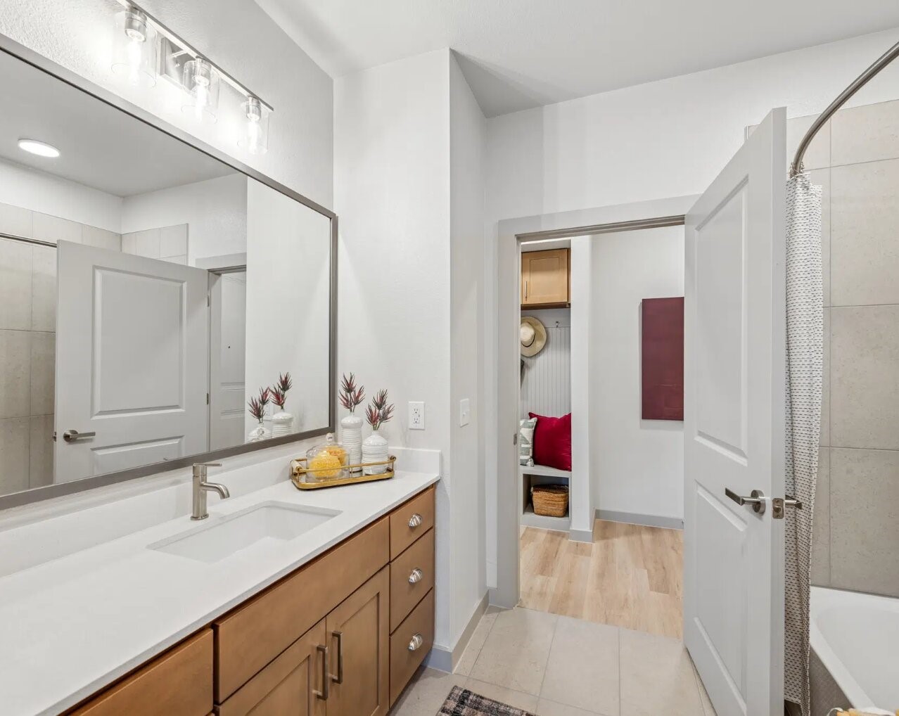 17013 Becker Road, Unit 7309 Hockley, TX 77447 - Photo 6 of 18 a bathroom with a sink vanity and mirror