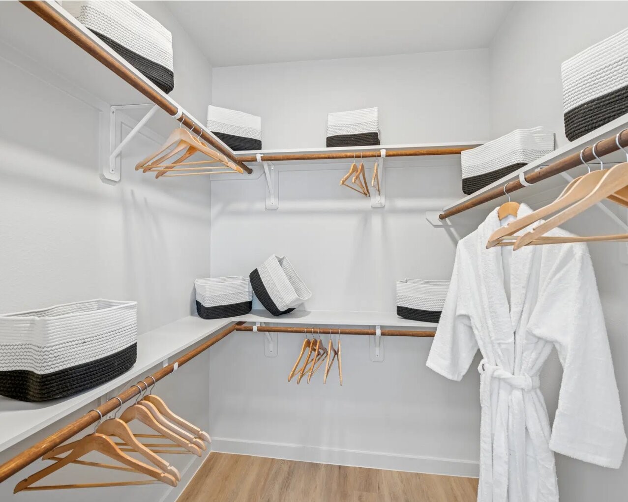 17013 Becker Road, Unit 7309 Hockley, TX 77447 - Photo 8 of 18 a view of walk in closet with clothes and shoes