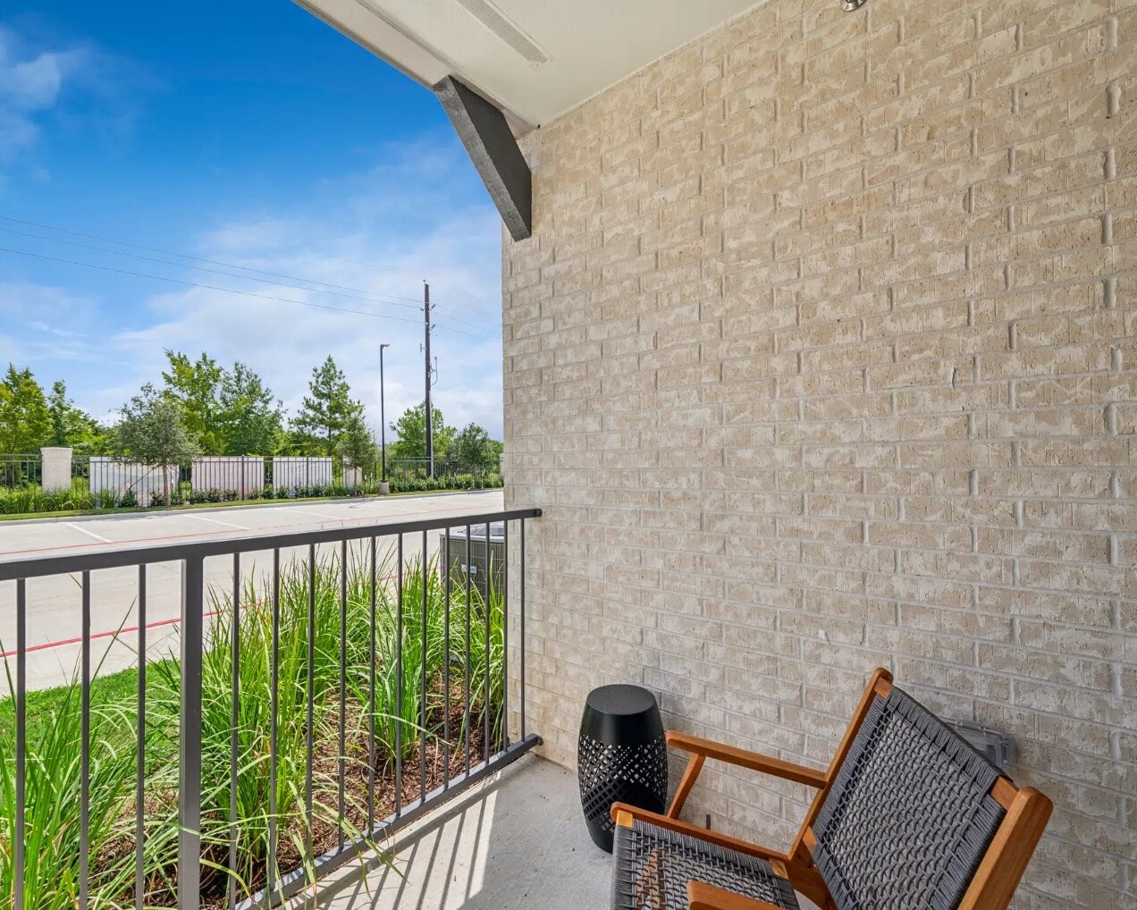17013 Becker Road, Unit 7309 Hockley, TX 77447 - Photo 9 of 18 a view of a chair in balcony