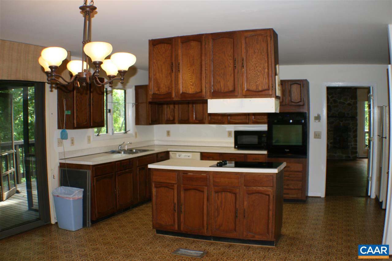 529 Blankenbaker Road Madison, VA 22727 - Photo 3 of 10 a kitchen with a sink and a stove