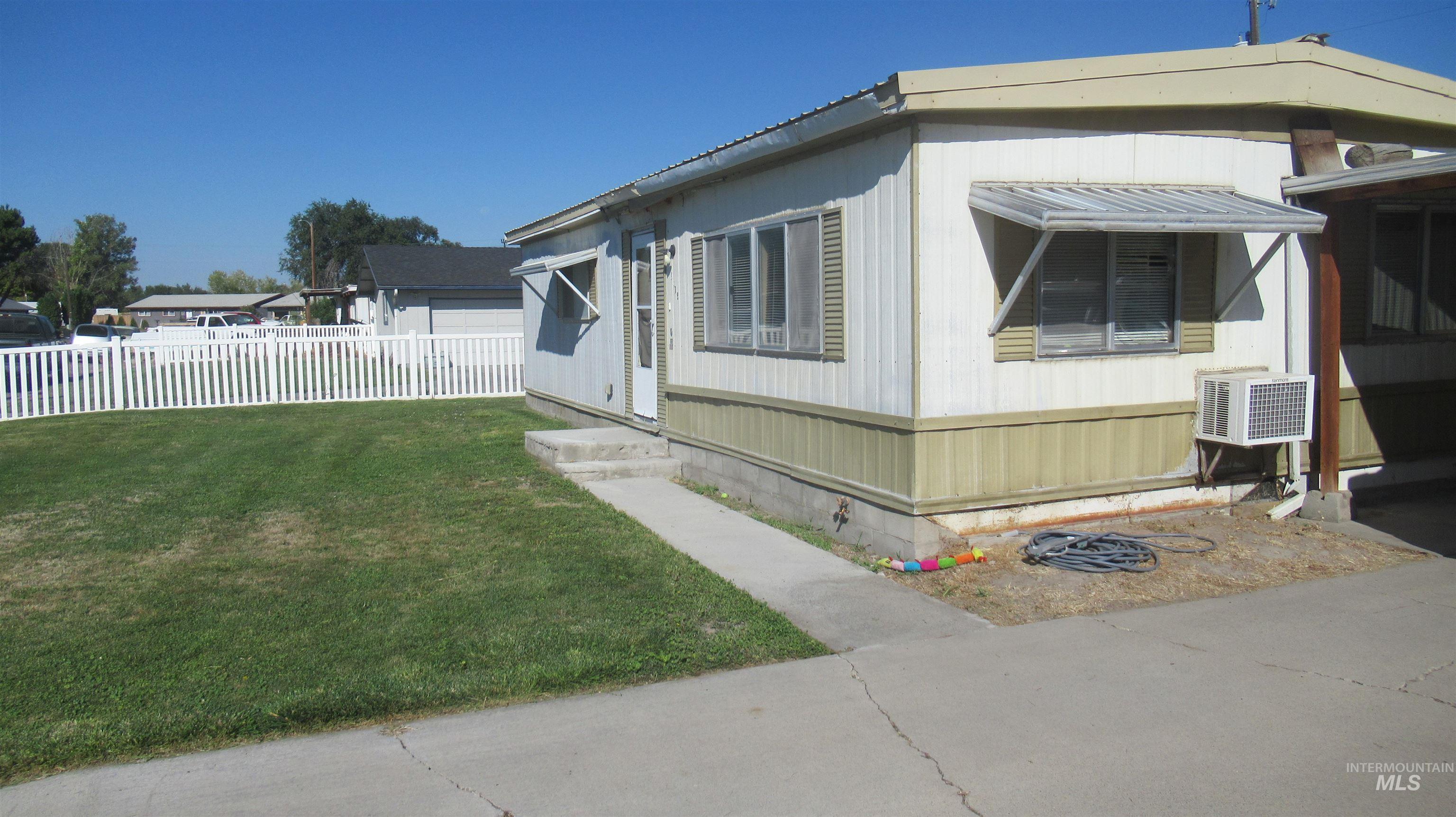 1109 West D Vale, OR 97918 - Photo 2 of 19 Picket fence enclosing a grassy yard