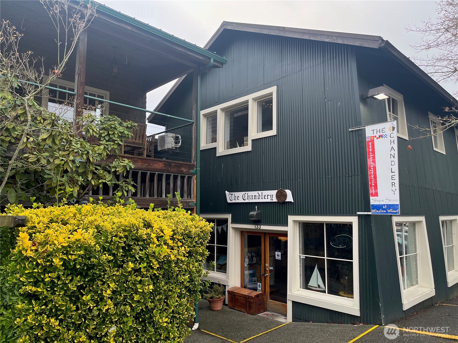 141 Parfitt Way Southwest, Unit A35 Bainbridge Island, WA 98110 - Photo 11 of 16 a front view of house with yard