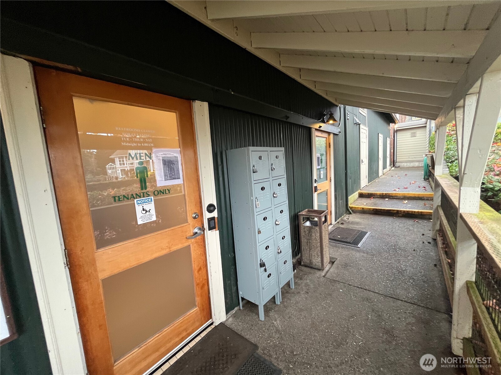 141 Parfitt Way Southwest, Unit A35 Bainbridge Island, WA 98110 - Photo 12 of 16 a view of a hallway with furniture and front door