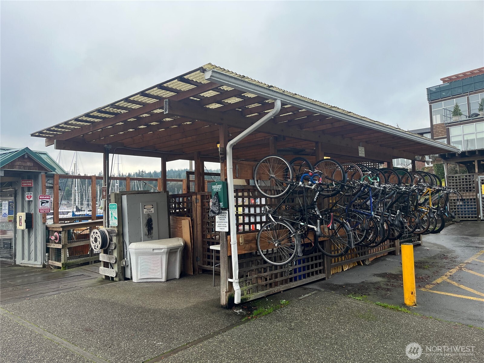 141 Parfitt Way Southwest, Unit A35 Bainbridge Island, WA 98110 - Photo 14 of 16 a view of a garage with wooden wall