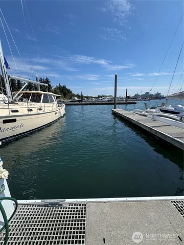 a view of a lake with a car parked