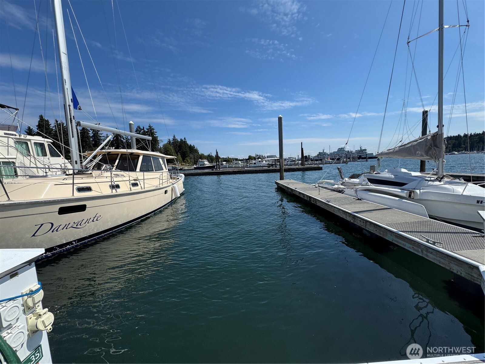 141 Parfitt Way Southwest, Unit A35 Bainbridge Island, WA 98110 - Photo 6 of 16 a view of a balcony with chairs